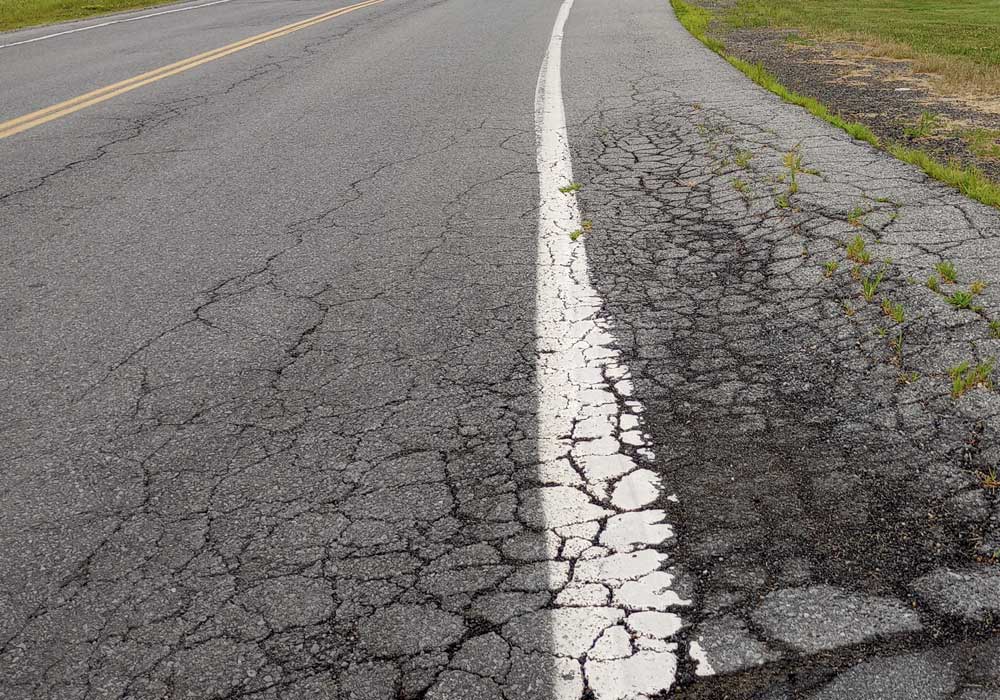 Crumbling blacktop low PCI